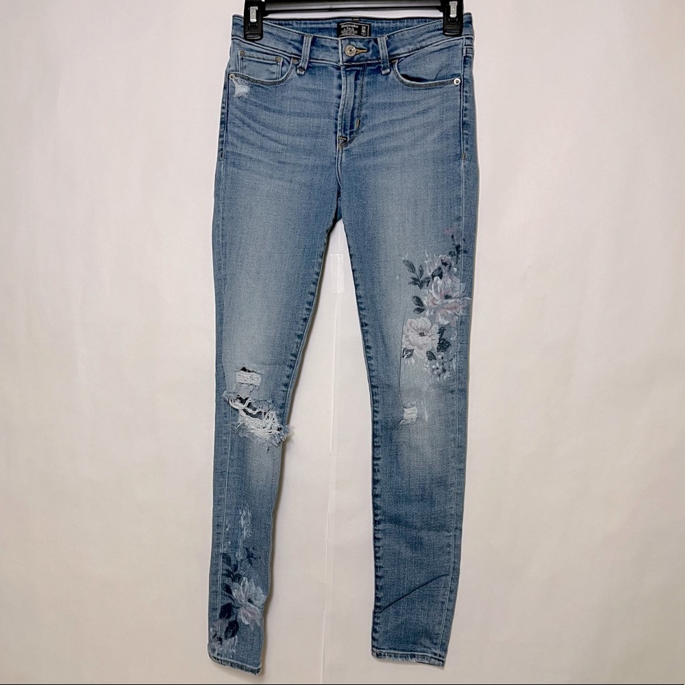 Floral printed light wash jeans